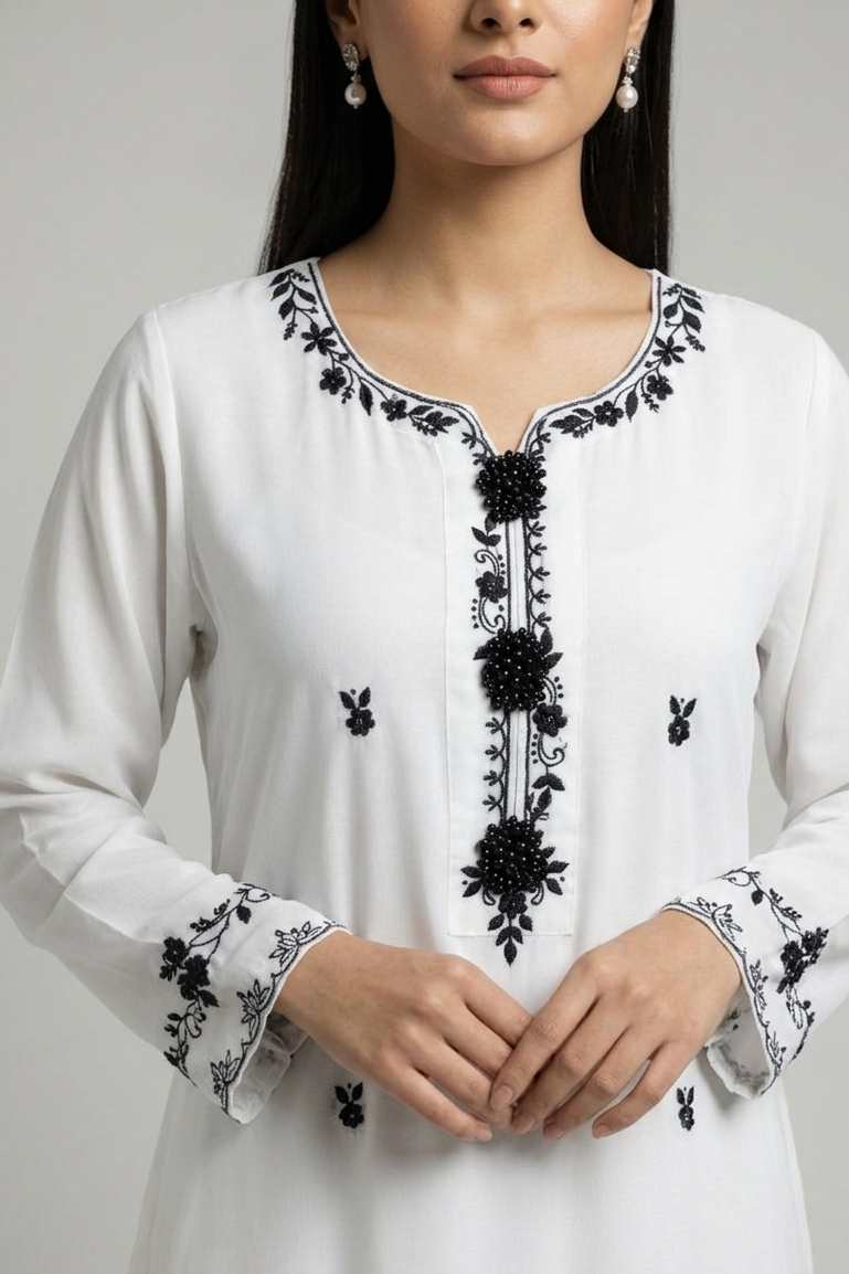 Elegant White Kurta with Intricate Black Embroidery